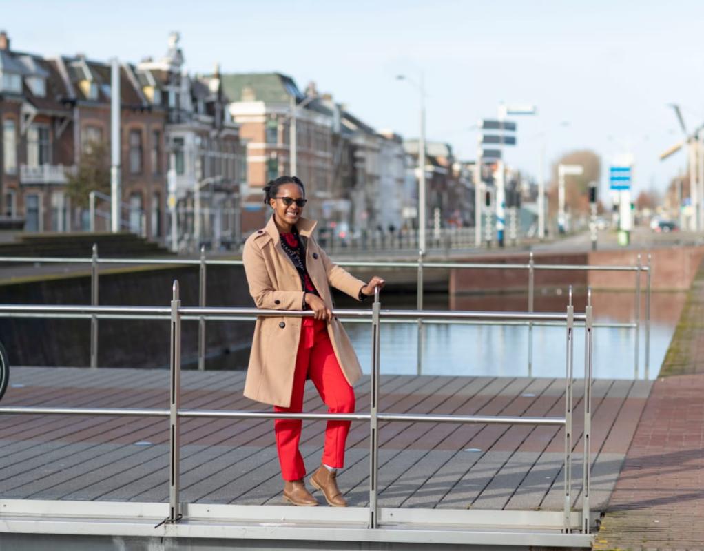A girl on a bridge in Delft