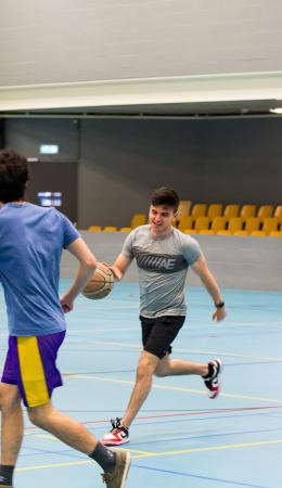 Students playing basketball