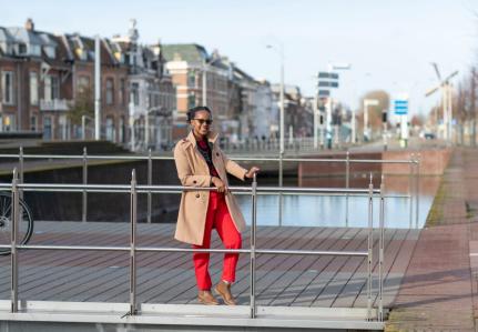A girl on a bridge in Delft