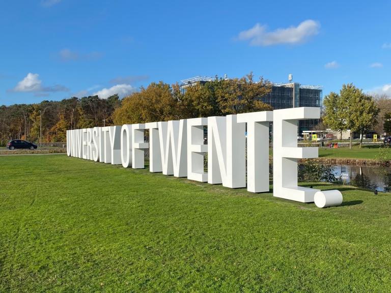 Letters in a field saying University of Twente